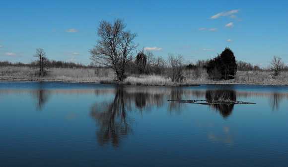 Blue sky pond reflection